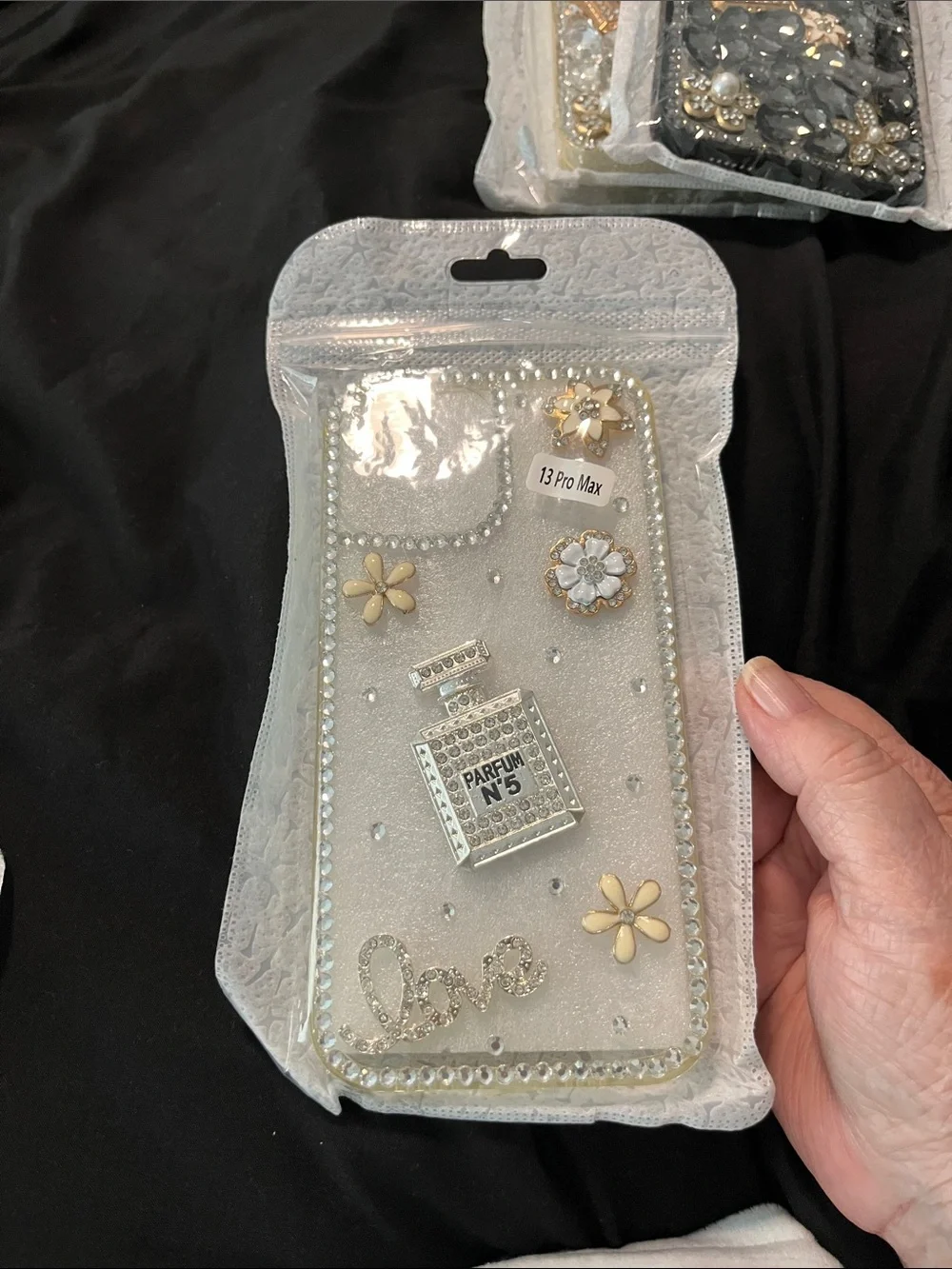 White Rhinestone Parfum Bottle Decorative Phone Case (13 Pro Max)